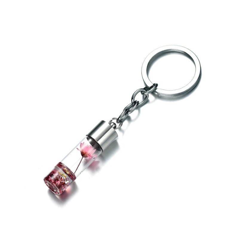 Porte-clés créatif flacon avec fleur rose sèche