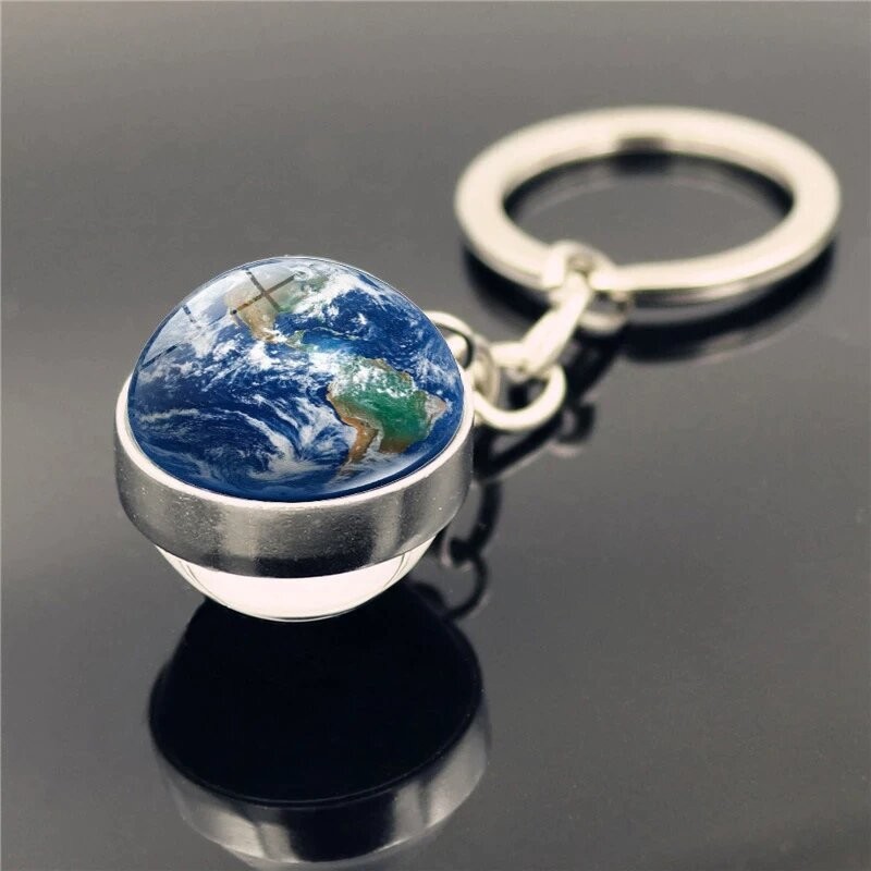 Porte clé boule de verre carte du monde